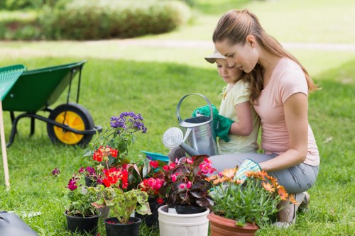 Team member using PPE during garden work